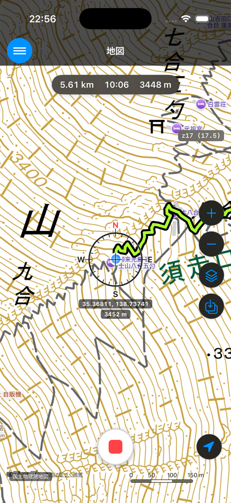 GPS ログ記録中の地図画面。緑のラインで軌跡が描かれ、ナビゲーションバーの下に移動距離・経過時間・標高、画面下部に停止ボタンが表示されている